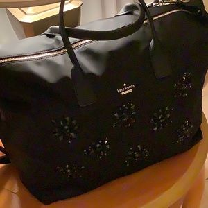 Dazzling black nylon kate spade weekender bag